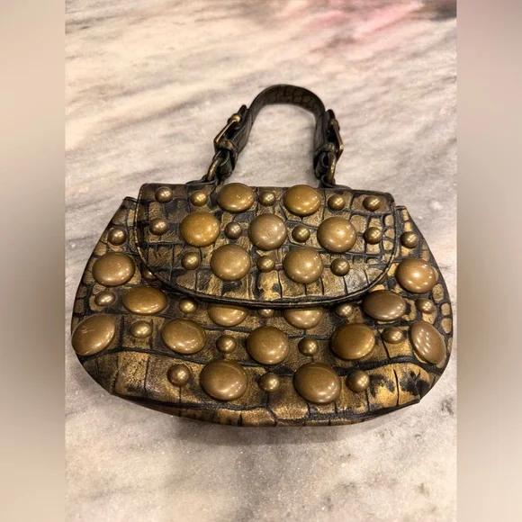 Rock out with this cool clutch by B. Johnson. Brass studs, faux alligator hide - Picture 2 of 6